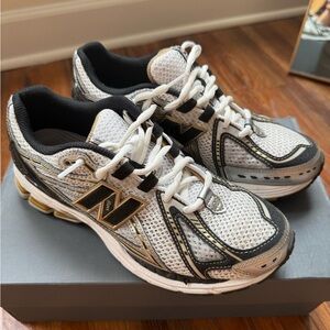 New Balance Women's White, Black, and Gold Athletic Shoes